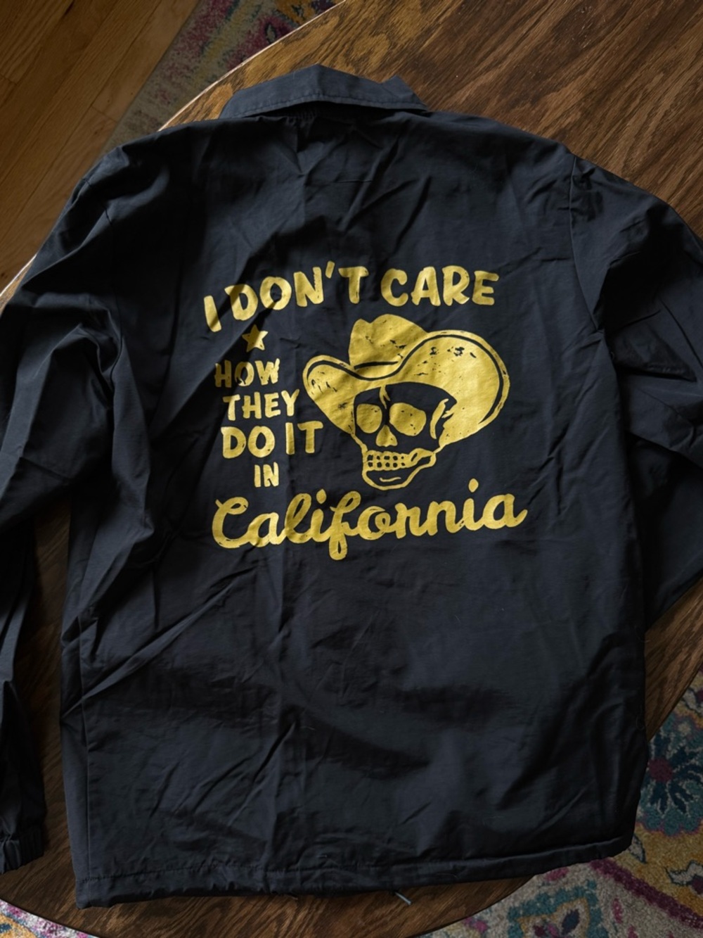 Black Shell/Jacket with “I don’t care…California”